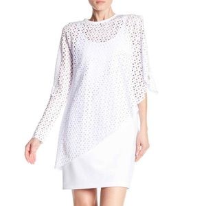 Grayse Asymmetrical Laser Cut Top. Size Medium. Super flattered. Unique.